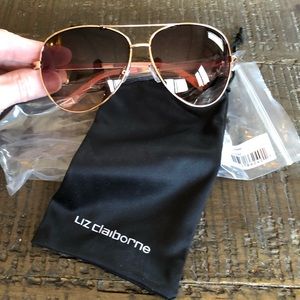 Rose Gold sunglasses. NEW